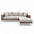 Modern sectional sofa in light grey fabric with brown leather accents and chrome legs 250 x 90 x 85cm